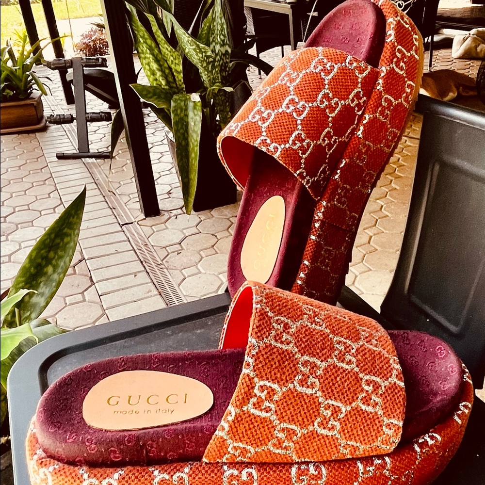 GG Platform Slides. Rich brown/orange fabric upper and GG silver logo.